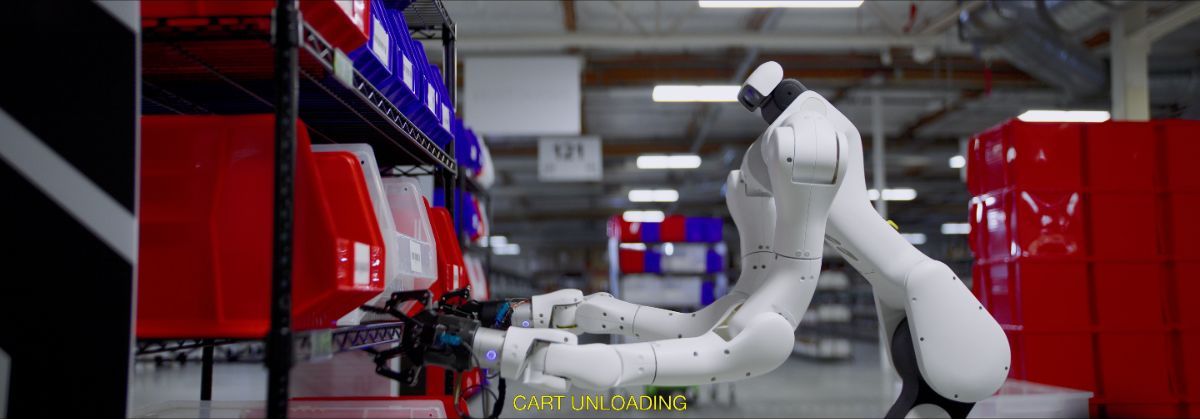 Skild AI — robot arm at the racking