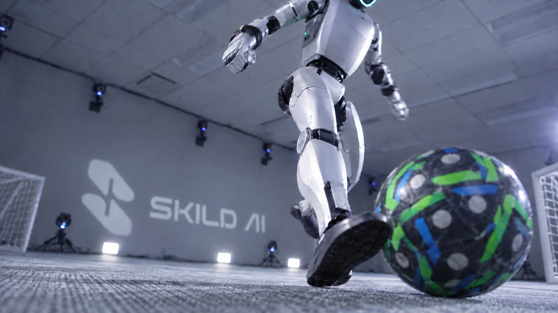 Skild AI &mdash; Physical Self-Play, humanoid kicking the ball
